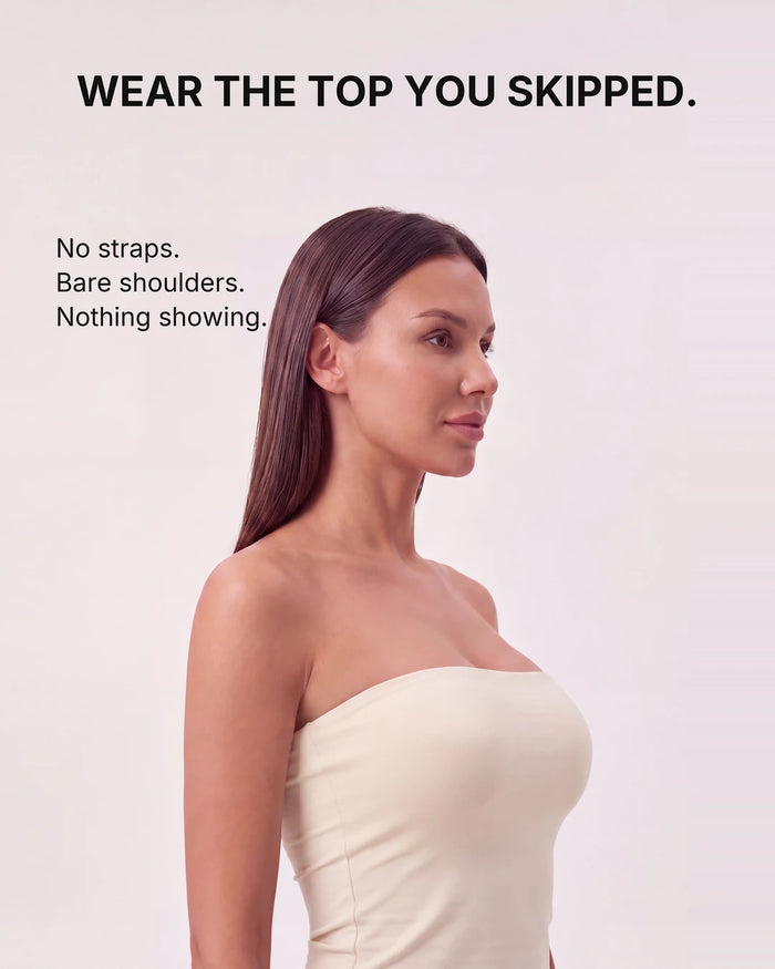 Woman wearing a tube top over the strapless bra, bare shoulders
